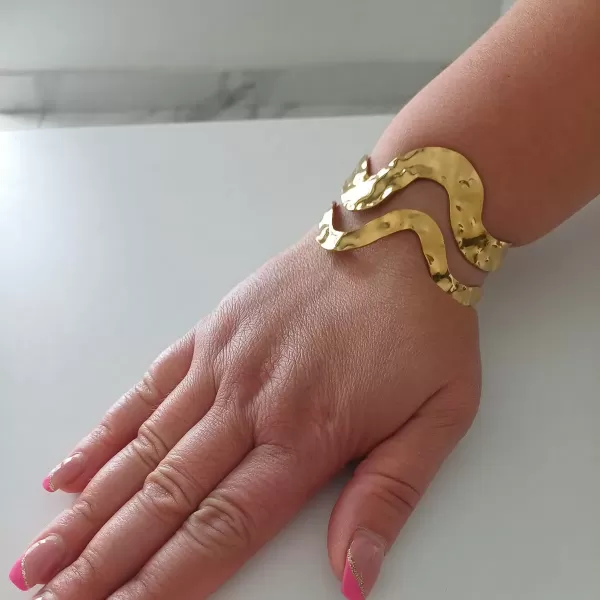 Bracciale rigido Onda in acciaio gold